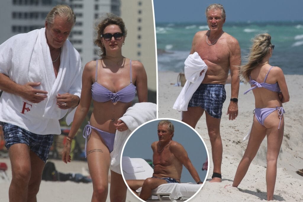 Dolph Lundgren, 67, was photographed hitting the beach in Miami with his wife, Emma Krokdal, 28, on Tuesday.MEGA