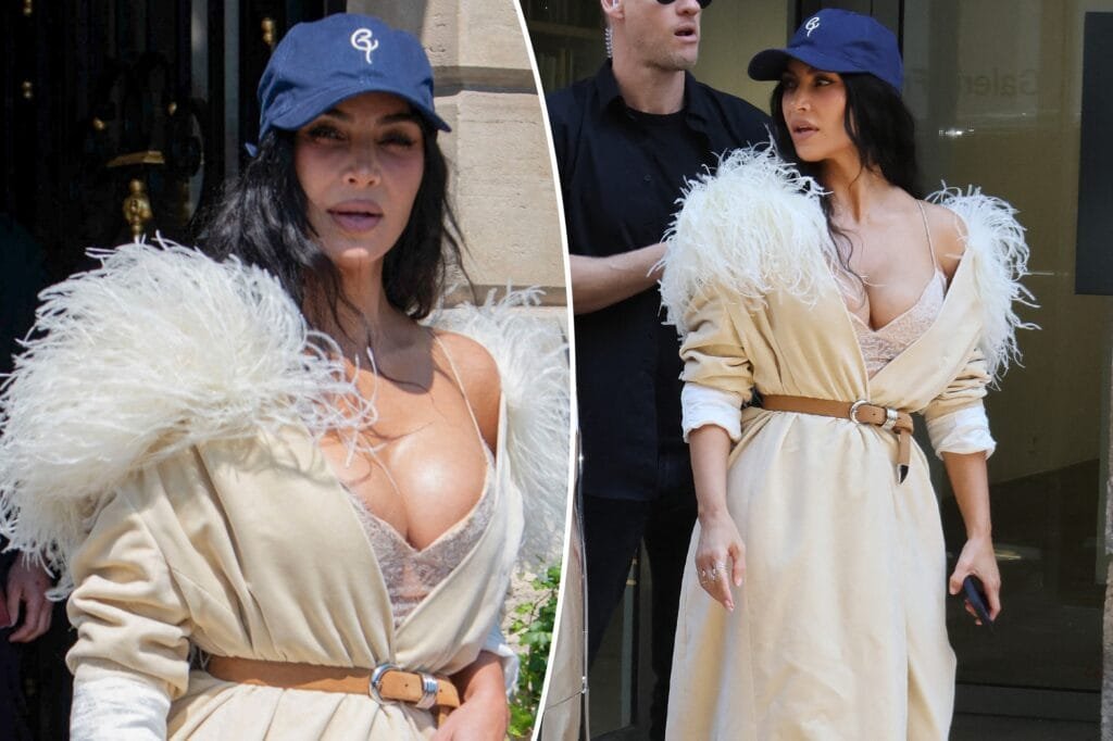 Kim Kardashian rounded out her lunchtime attire with a dark blue baseball cap over her wavy black hair.AbacaPress / SplashNews.com