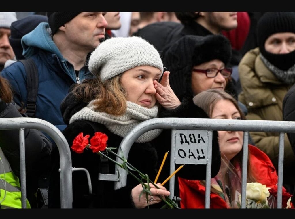 Mourners gather in front of the Mother of God Quench My Sorrows church in Moscow on Friday before the funeral for late Russian opposition leader Alexei Navalny. (Alexander Nemenov/AFP/Getty Images)