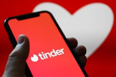 tinder logo displayed phone screen 7421407588169837863253656399jpg