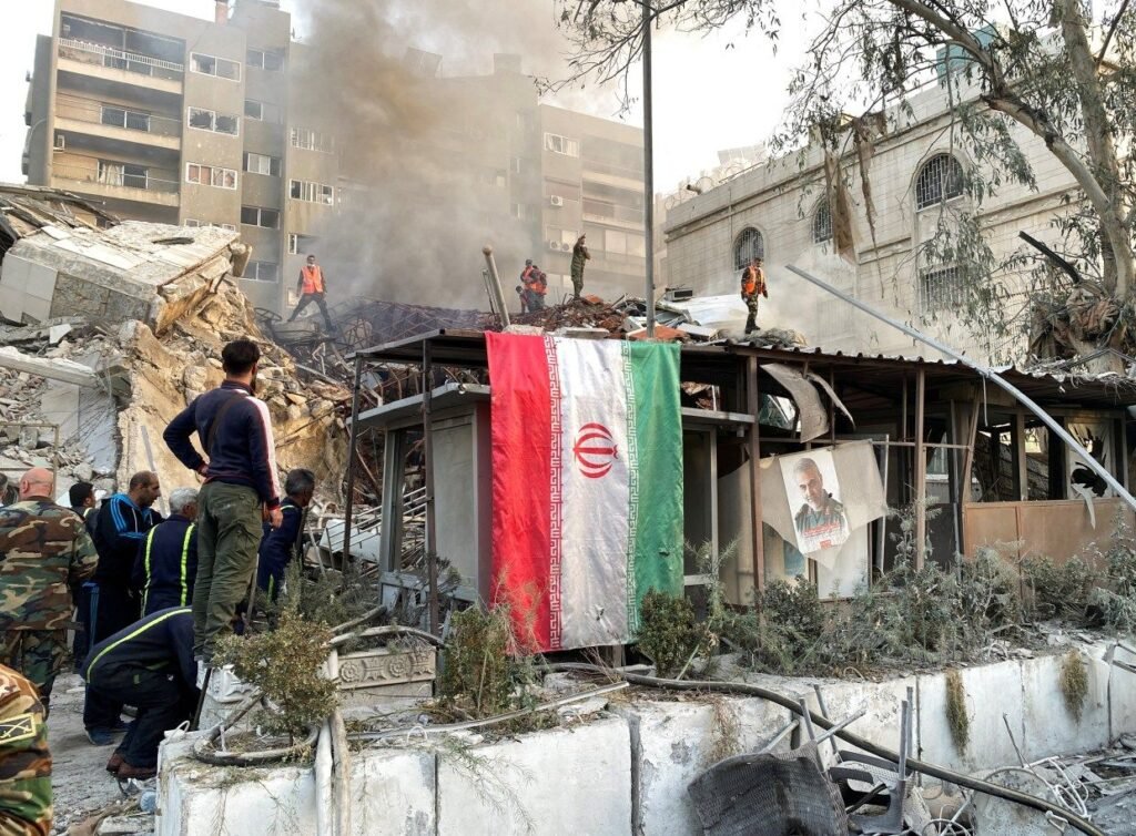 iranian flag hangs smoke rises 8910425354577856566513211521jpg