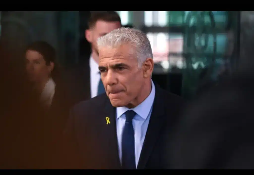 (Olivier Douliery/AFP) File – Opposition leader Yair Lapid speaks to reporters after meeting with US Secretary of State Antony Blinken at the US State Department on April 8, 2024, in Washington, DC. (Olivier Douliery/AFP)