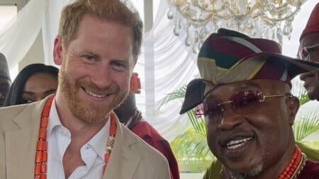 Oba Abdulrasheed Adewale Akanbi was pictured shaking hands with Prince Harry