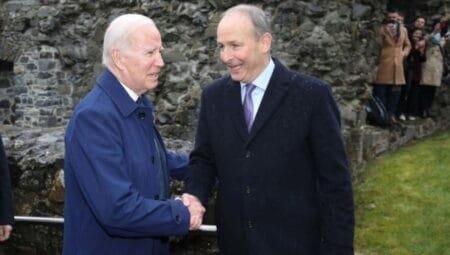 The Tánaiste has said it is not appropriate for the US president to criticise the International Criminal Court.