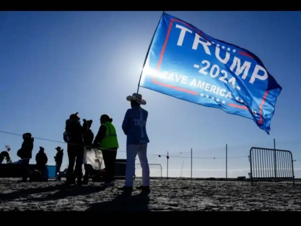 Some fans even donned Trump costumes and American flag-themed outfits for the rally (AP) Some fans even donned Trump costumes and American flag-themed outfits for the rally (AP)