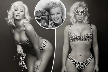 Kim Kardashian modeled an animal-print bikini and matching eye mask in a black-and-white photoshoot she shared on Instagram Wednesday. Kim Kardashian/Instagram