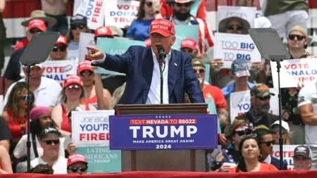 Former President Trump points during a campaign rally at Sunset Park in Las Vegas on June 9, 2024. (Jim Watson/AFP via Getty Images)