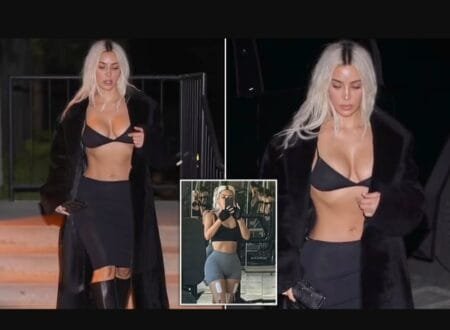The mom-of-four, who shocked fans at how small her waist has become at the Met Gala last month, completed her racy ensemble with a pair of tall leather boots