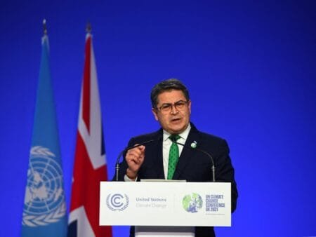 Honduras' President Juan Orlando Hernandez presents his national statement as a part of the World Leaders' Summit at the UN Climate Change Conference (COP26) in Glasgow, Scotland, Britain November 1, 2021.POOL (REUTERS)
