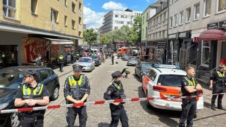 Screen grab of moments after a man carrying an axe was shot down by police officers in the St. Pauli district of Hamburg, before Euro 2024 match between Poland v Netherlands in Hamburg, Germany. June 16, 2024, Nonstopnews/via Reuters
