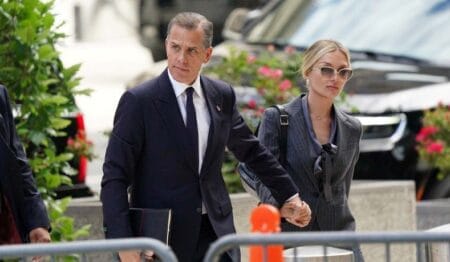 Hunter Biden held the hand of wife Melissa Cohen Biden on his way into the courthouse.REUTERS