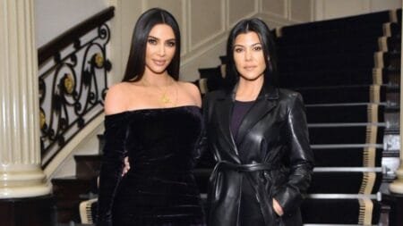 Kourtney Kardashian used Instagram to interact with fans on Sunday, sharing how she and sister Kim Kardashian take 'walks' together