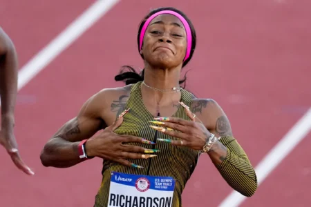 Sha’Carri Richardson celebrates her win in the wins women’s 100-meter run final during the U.S. Track and Field Olympic Team Trials on Saturday. AP