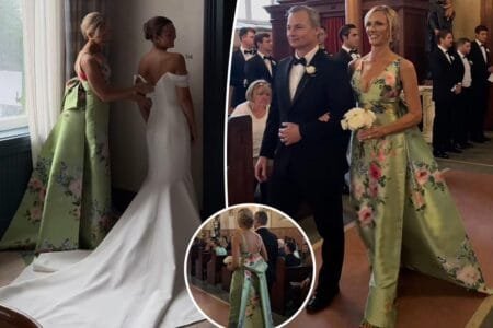 Lori DeWitt wore a custom Audrey + Brooks dress with a plunging neckline, detachable bow and train.Instagram / @capturedbychloe.co