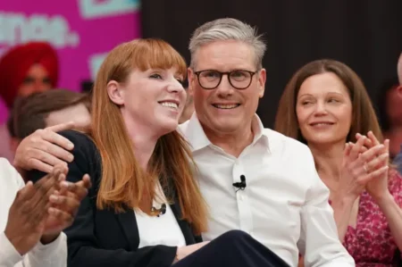 Labour’s deputy leader Angela Rayner, left, with leader Sir Keir Starmer and his wife Victoria (Picture: Stefan Rousseau/PA Wire)
