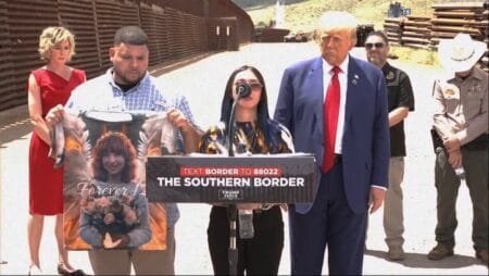 Trump comforts Alexis Nungaray, mother of Jocelyn Nunagaray, who was killed by undocumented migrants, at the U.S.-Mexico border fence on Aug. 22, 2024, south of Sierra Vista, Arizona.Getty Images