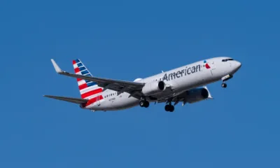 A New Jersey woman says in a new lawsuit that she was sexually assaulted on an American Airlines flight by the stranger sitting next to her