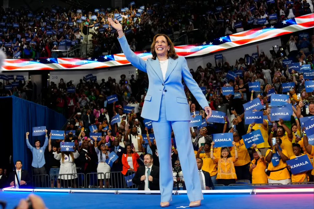 Vice President Kamala Harris waves during a campaign rally, July 30, 2024, in Atlanta AP