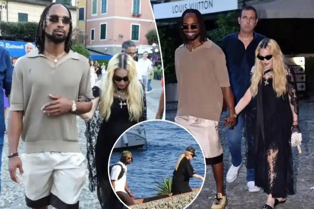 Madonna and Akeem Morris hold hands in Portofino, Italy, on Tuesday. COBRA TEAM / BACKGRID