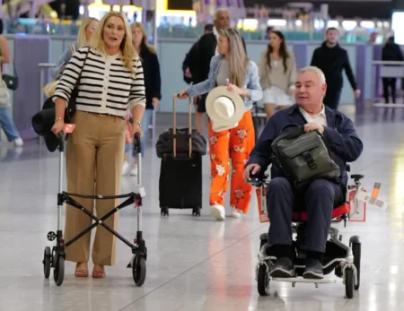 Eamonn Holmes and girlfriend Katie Alexander arrived at Barcelona airportCredit Andrew Styczynski