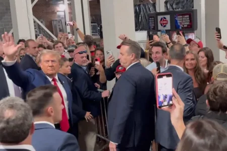 Former President Donald Trump waving to fans at the University of Alabama college football game at Bryant-Denny Stadium on Sept. 28, 2024. Dan Scavino Jr./X