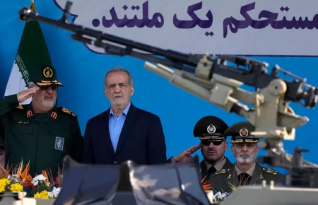 Iranian President Masoud Pezeshkian reviews an annual armed forces parade on Sept 21