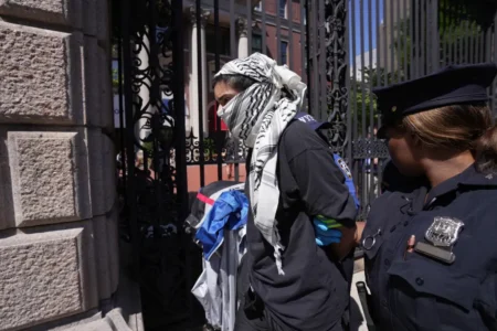Members of the New York City Police Department arresting a pro Palestine protestor during a demonstration outside Barnard College of Columbia University