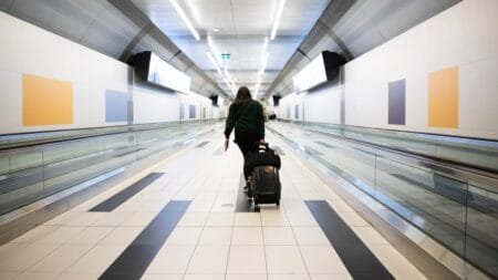 People walk through Billy Bishop Airport in Toronto on Friday July 19 2024