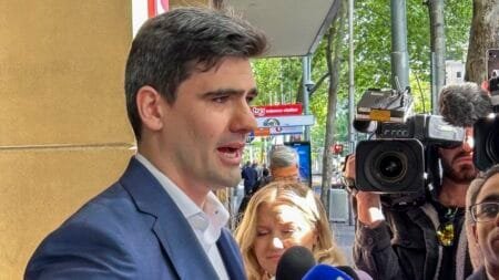 Jacob Hersant, a self-described Nazi, talks to the media outside the Melbourne Magistrates Court (Rod McGuirk/AP)