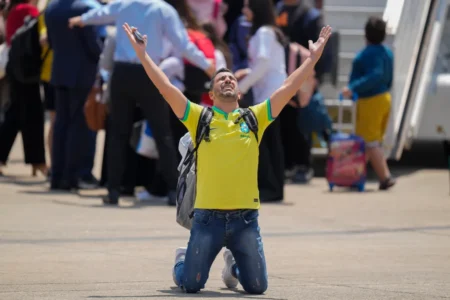 A Brazilian man celebrates after evacuating Lebanon as nations around the world urge their citizens to leave