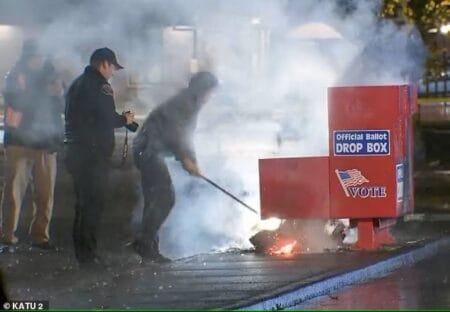 Authorities working to put out a fire at a ballot box in Vancouver WA started early Monday morning It was one of two fires set at two ballot boxes in two separate states early Monday