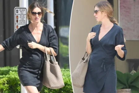 Pregnant Gisele Bundchen wears a cute black minidress as she runs errands in Miami