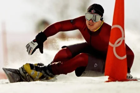 Ryan Wedding of Canada competes in the qualifying round of the men’s parallel giant slalom snowboarding event during the Salt Lake City Winter Olympic Games in 2002. (Adam Pretty / Getty Images)