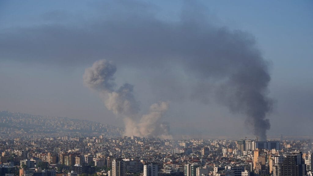 Smoke billows over Beirut's southern suburbs, amid ongoing hostilities between Hezbollah and Israeli forces, as seen from Sin El Fil, Lebanon October 5, 2024. REUTERS/Joseph Campbell