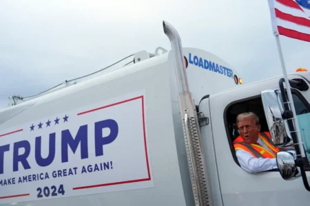 The custom garbage truck was waiting for Trump on the tarmac as he landed in Wisconsin