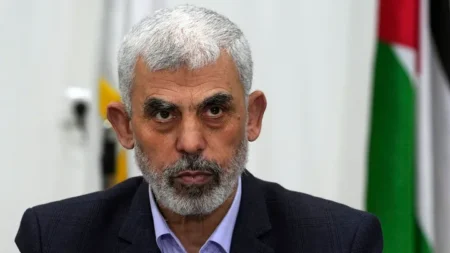 Yahya Sinwar chairs a meeting with leaders of Palestinian factions at his office in Gaza City, April 13, 2022. (AP)