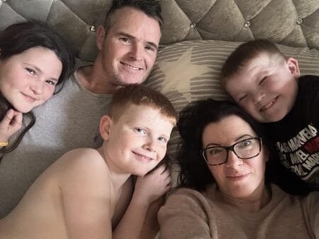 Claire Turner, 43, is living with terminal cancer. She is pictured with her husband and three children.Kennedy News and Media
