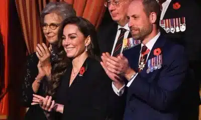 A bearded Prince William and Princess Kate were all smiles this evening as they clap as the performers take to the stage