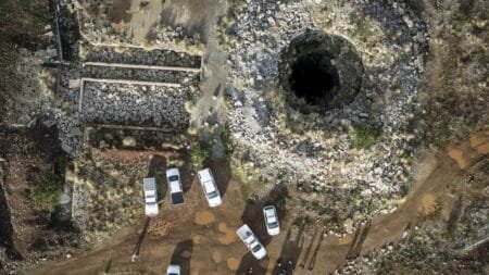 An aerial view of a mine shaft where an estimated 4000 illegal miners are trapped in a disused mine in Stilfontein, South Africa, Wednesday, Nov.13, 2024. (AP Photo)