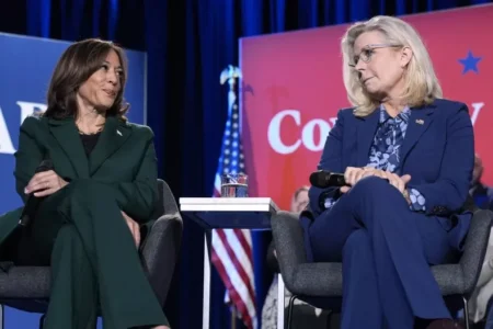 Democratic presidential nominee Vice President Kamala Harris left and former Republican Congresswoman Liz Cheney participate in a town hall at the Royal Oak Theatre in Royal Oak Mich Monday Oct 21 2024