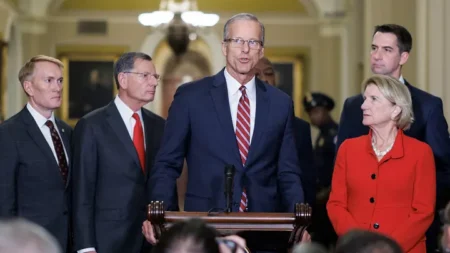 Senator John Thune, R-S.D., center, newly elected Senate majority leader for the upcoming 119th Congress, speaks to reporters at the U.S. Capitol on Nov. 13, 2024 in Washington, D.C. (TING SHEN/AFP via Getty Images)