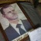 A portrait of Syrian President Bashar al-Assad is pictured with its frame broken, in a Syrian regime's Political Security Branch facility on the outskirts of the central city of Hama, following the capture of the area by anti-government forces, on December 7, 2024. © Omar Haj Kadour, AFP