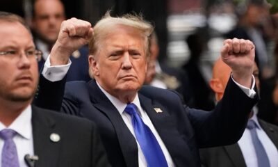 Former US President and Republican presidential candidate Donald Trump gestures as he arrives back at Trump Tower after being convicted in his criminal trial in New York City, on May 30, 2024. Timothy A. Clary, AFP/File