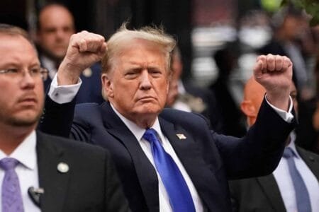 Former US President and Republican presidential candidate Donald Trump gestures as he arrives back at Trump Tower after being convicted in his criminal trial in New York City on May 30 2024 Timothy A Clary AFPFile