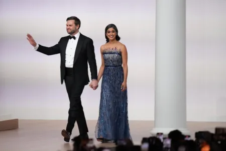 The former corporate lawyer stunned in a dazzling blue dress from Reem Acra.Getty Images
