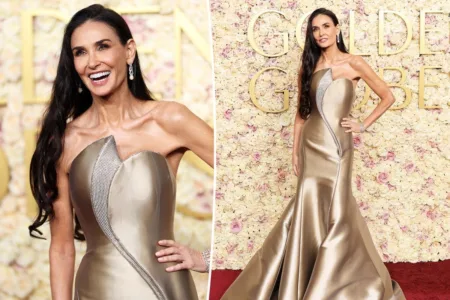 Demi Moore looked perfectly on theme in a golden Armani Privé gown at the 2025 Golden Globes.Jordan Strauss/Invision/AP