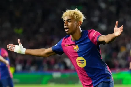 Thierry Henry praises Lamine Yamal after standout Champions League performance, hinting he could surpass Lionel Messi.
