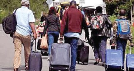 Nigerians abroad are returning home. FILE PHOTO: Travellers