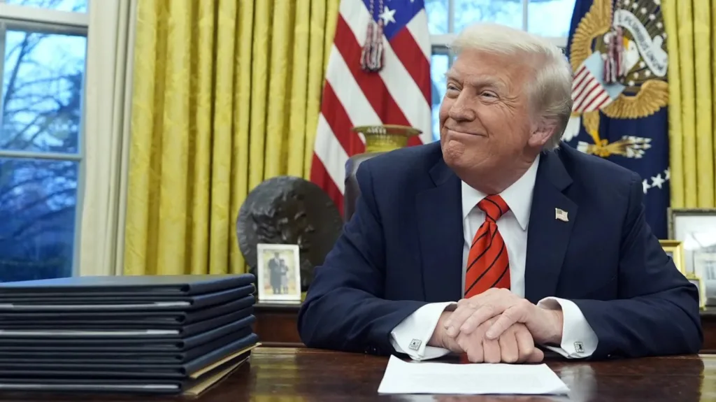 U.S. President Donald Trump speaks with reporters as he signs executive orders in the Oval Office at the White House, Monday, Feb. 10, 2025, in Washington. (Photo/Alex Brandon)