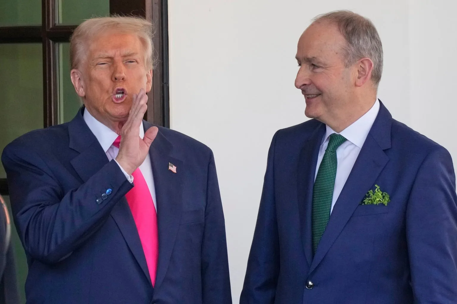 Ireland’s Prime Minister Michael Martin is greeted by President Donald Trump as he arrives at the West Wing of the White House in Washington, Wednesday, March 12, 2025.AP